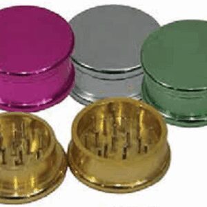 Five metallic herb grinders in different colors arranged in a group.